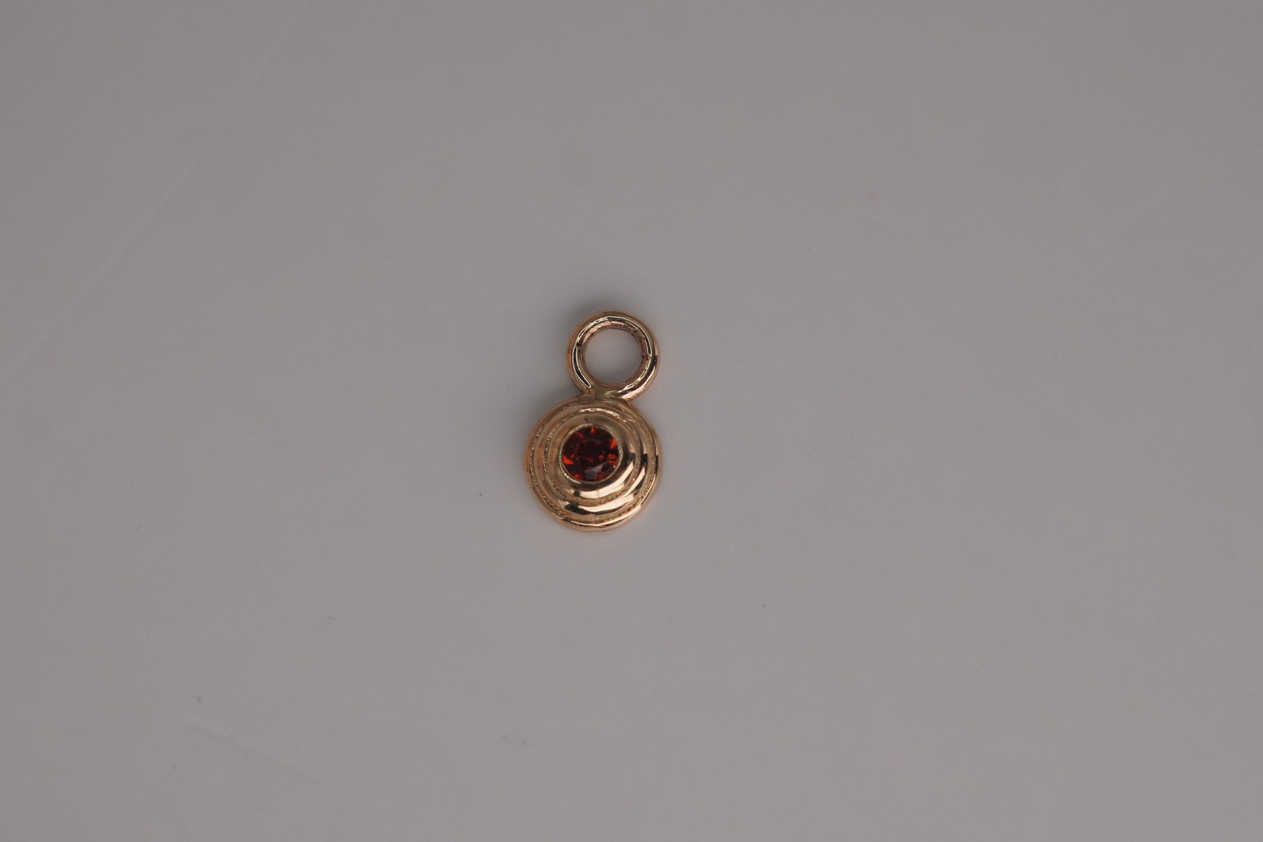 Omega 00 Charm in Garnet