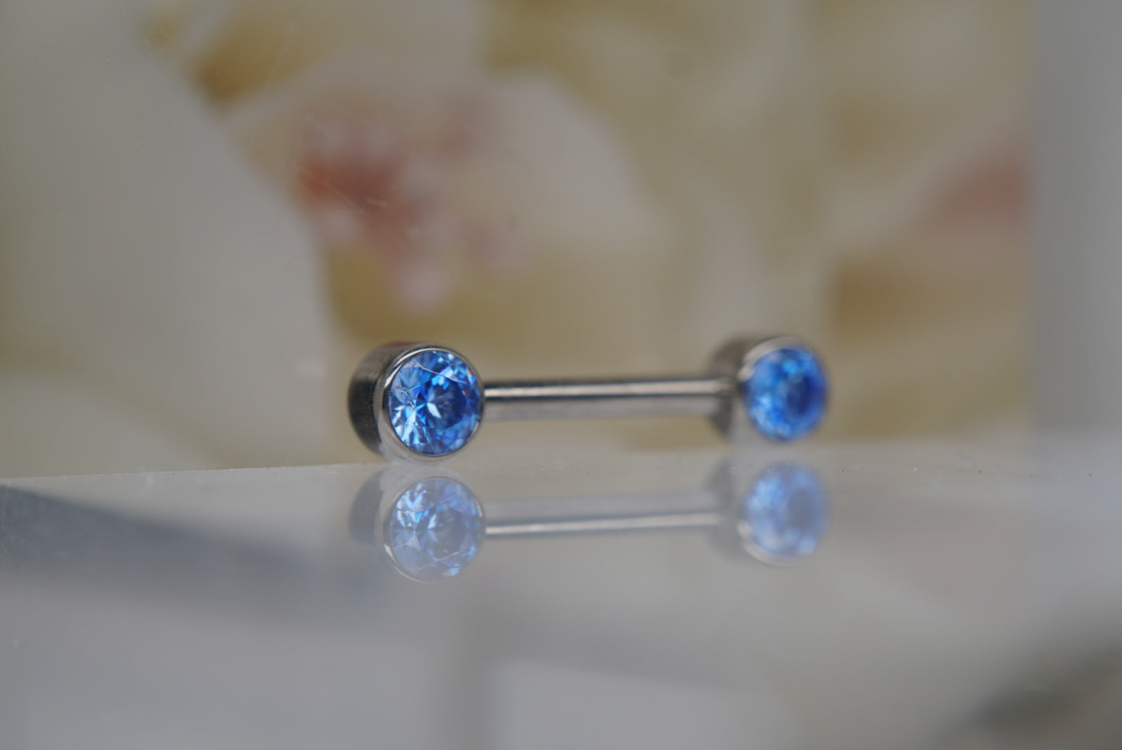 Arctic Blue Crystal Bezel Nipple Barbell in 14g