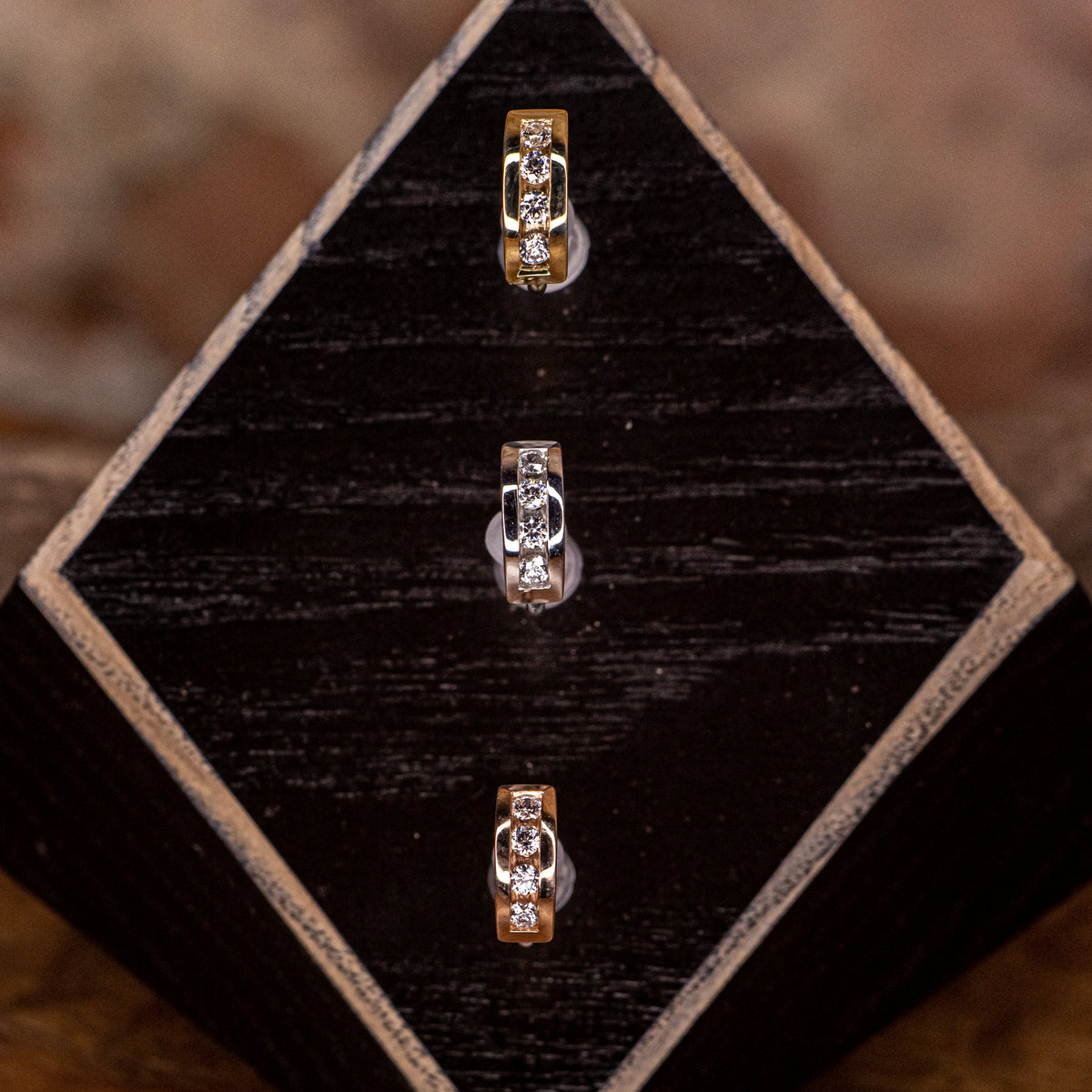 Four Gem Channel Clicker yellow gold side view