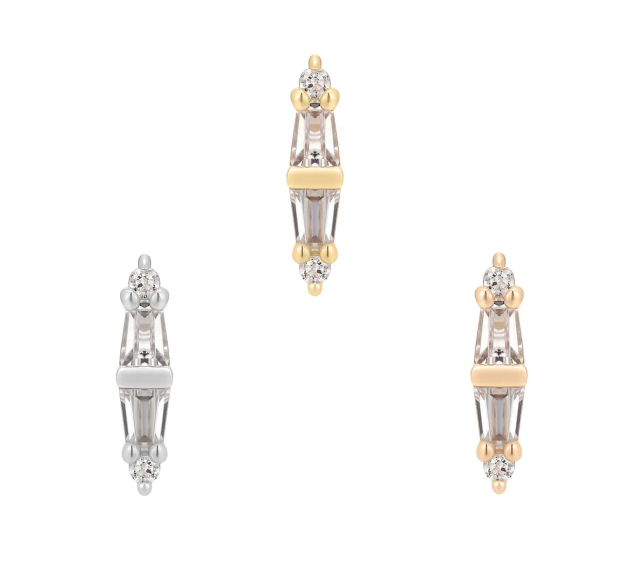 Stock image of Buddha Jewelry’s “Essential” in 14k yellow, white, and rose gold, featuring sleek linear designs with alternating crystals.