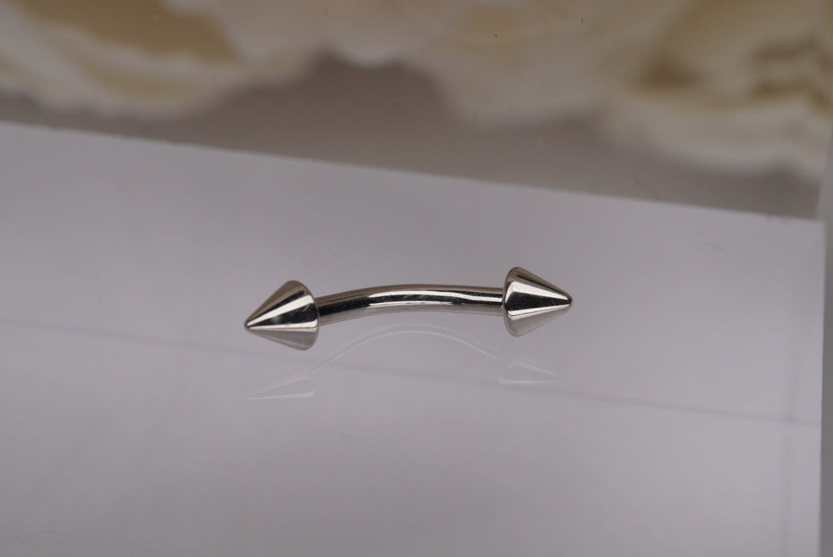 Curved Barbell with Spikes - 14G white gold