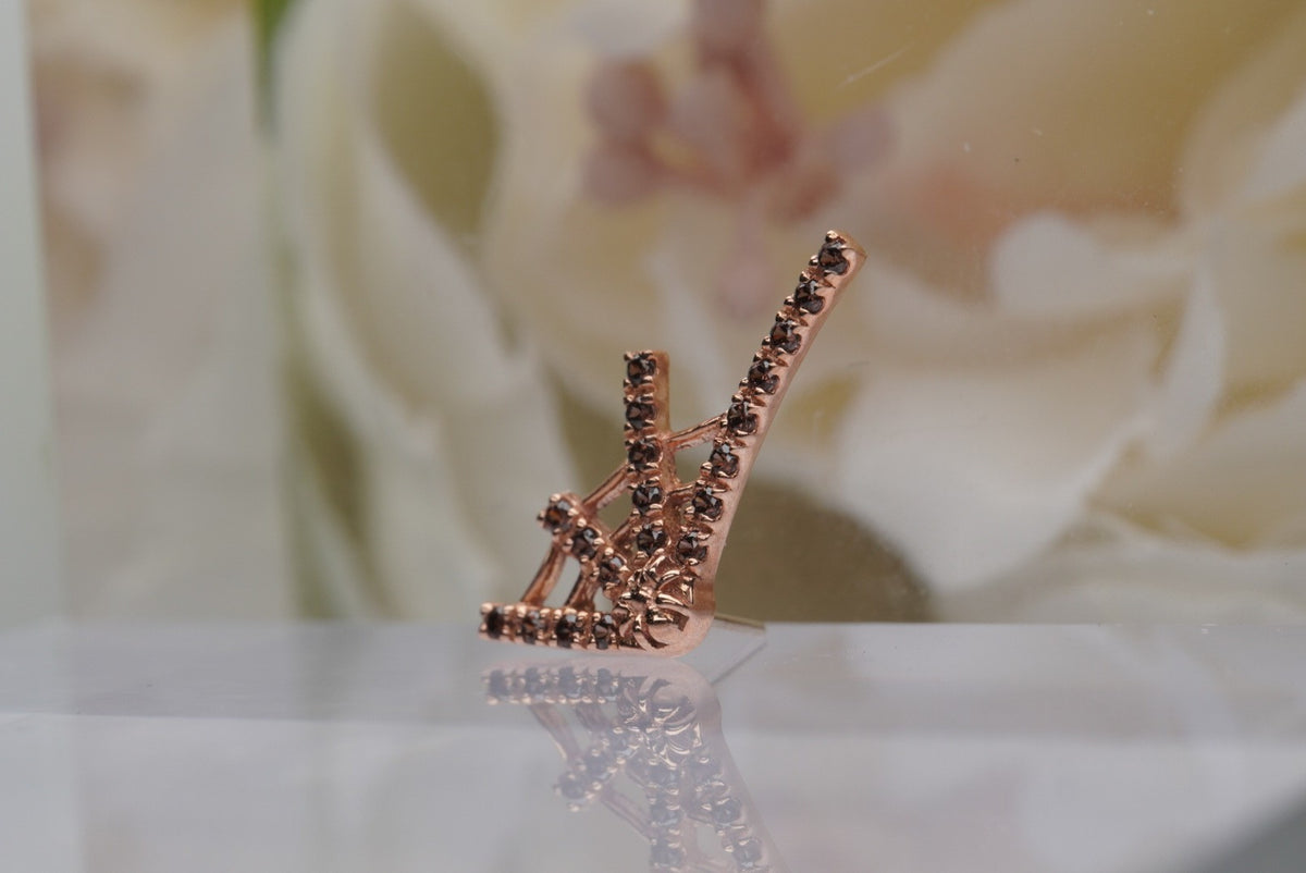 14k gold “Tarantula Web” in rose gold,  angled front view