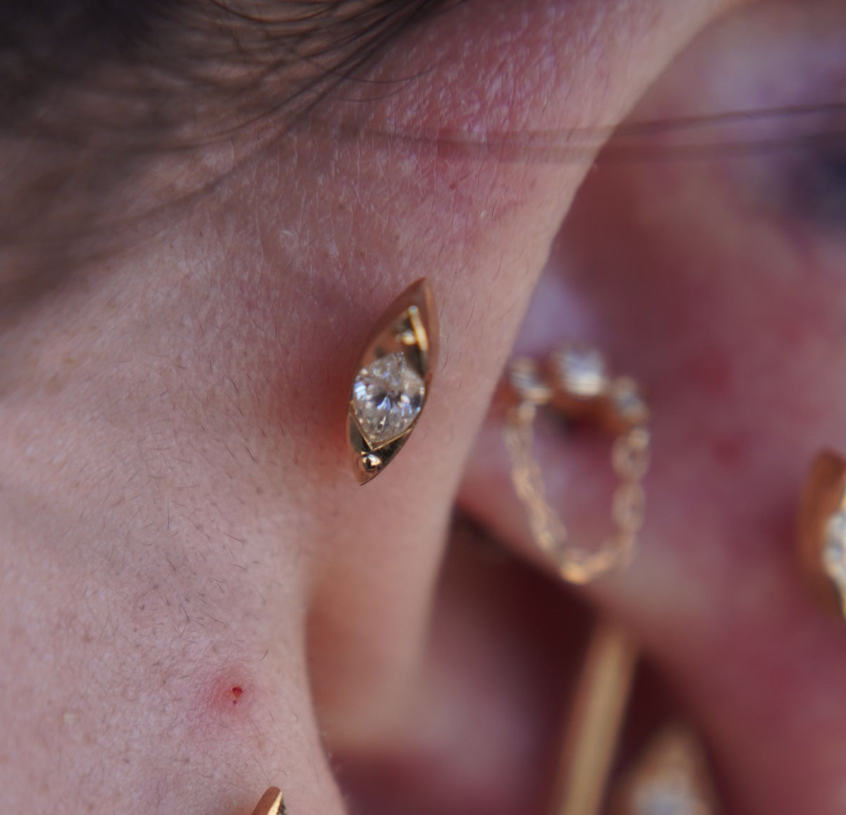 Tether 14k "Andromeda" in 2mm x 3.5mm marquise Diamond framed with open sides and elongated v-pointed prongs with a dramatic effect THREADLESS in yellow tragus