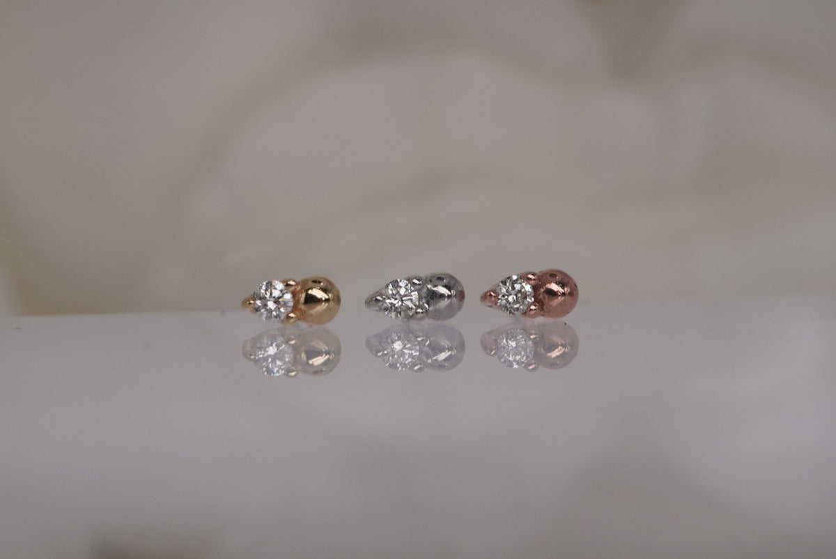 ngled view of Buddha Jewelry “Babe” threadless ends in 14k yellow, white, and rose gold, showing their sleek design and crystal detail.