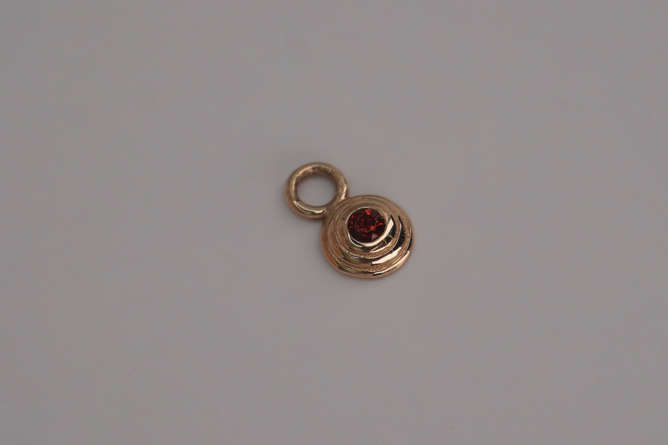 Omega 00 Charm in Garnet