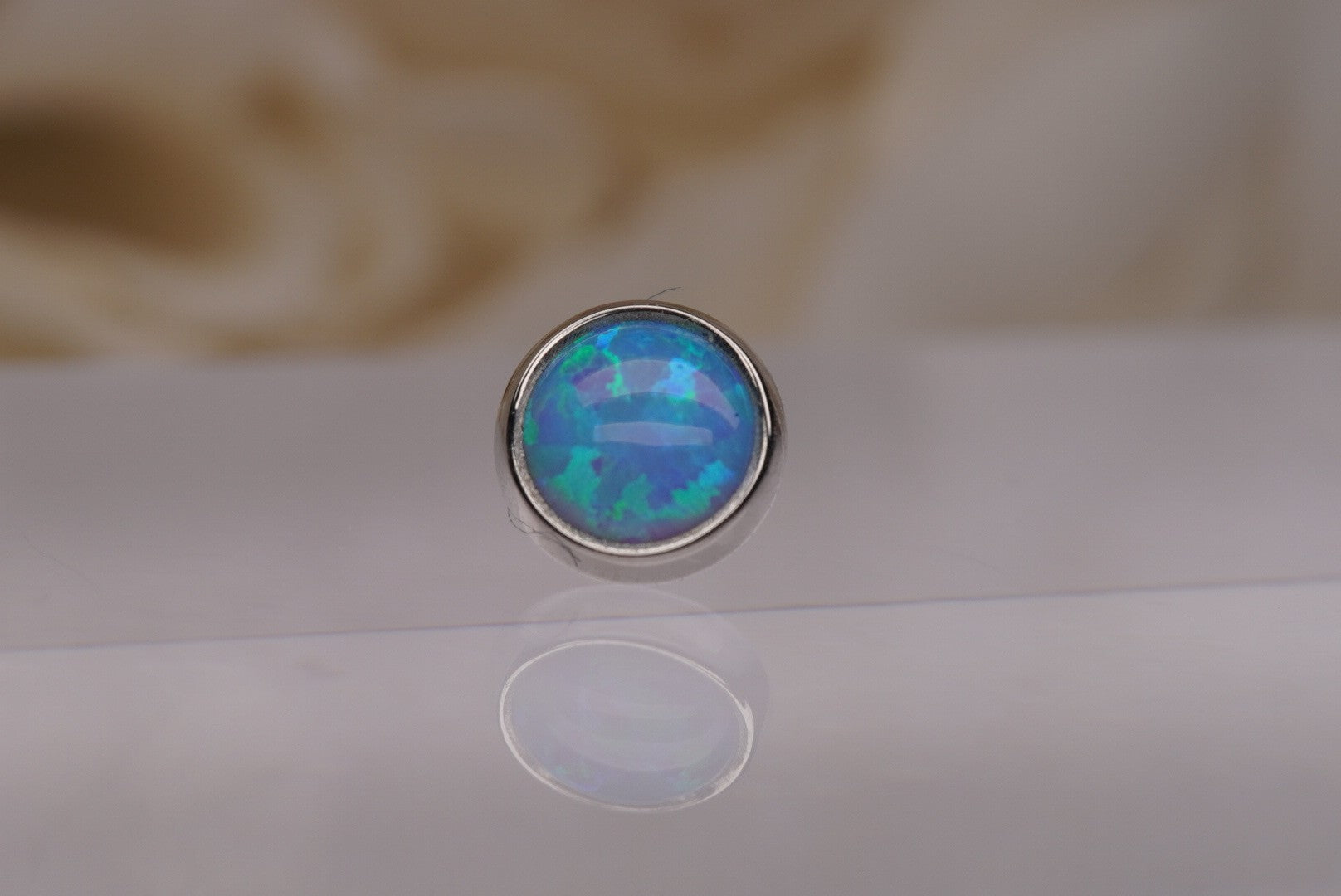 Capri Blue Opal in Gold- 5mm
