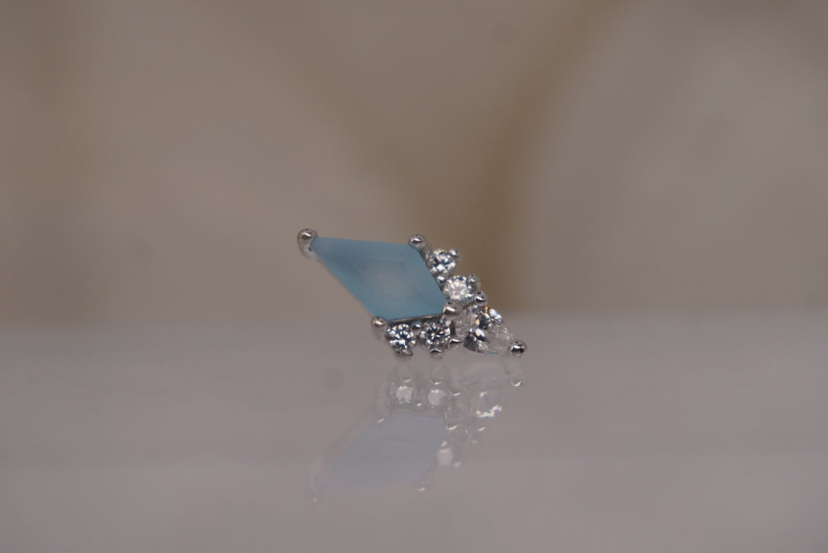Front view of the 14k white gold Afterglow threadless end with sandblasted Swiss blue topaz.