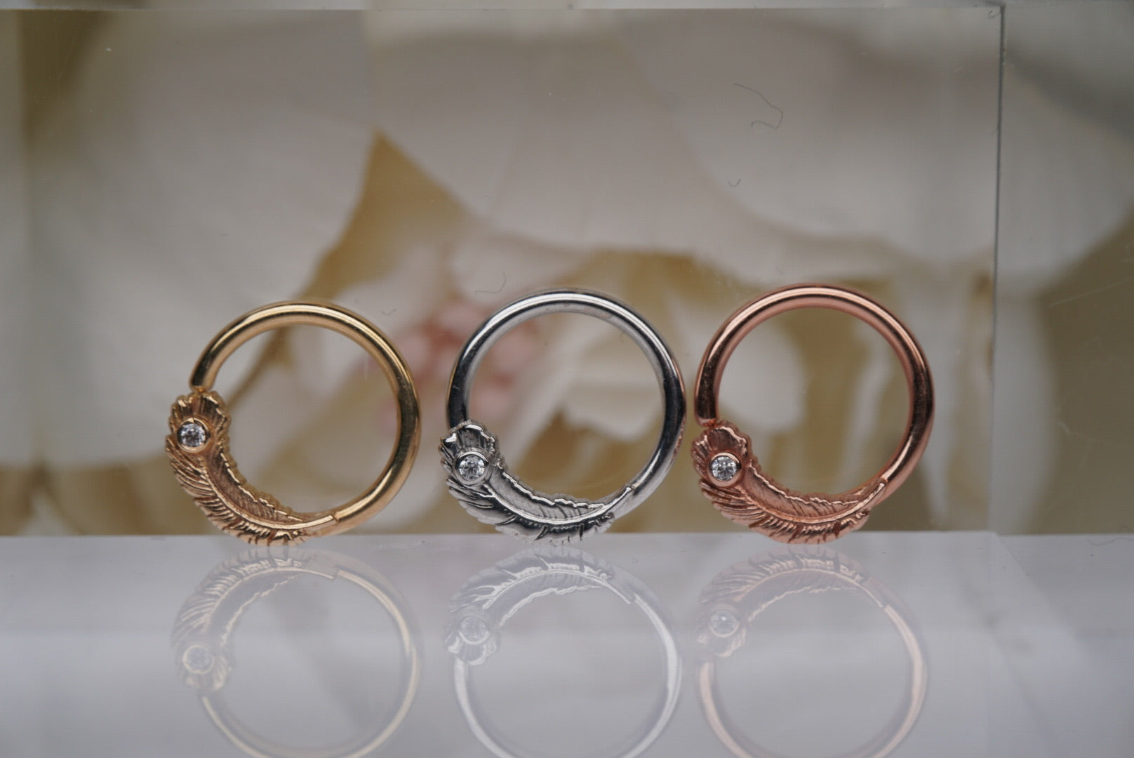 Feather Seam Ring with White Crystal