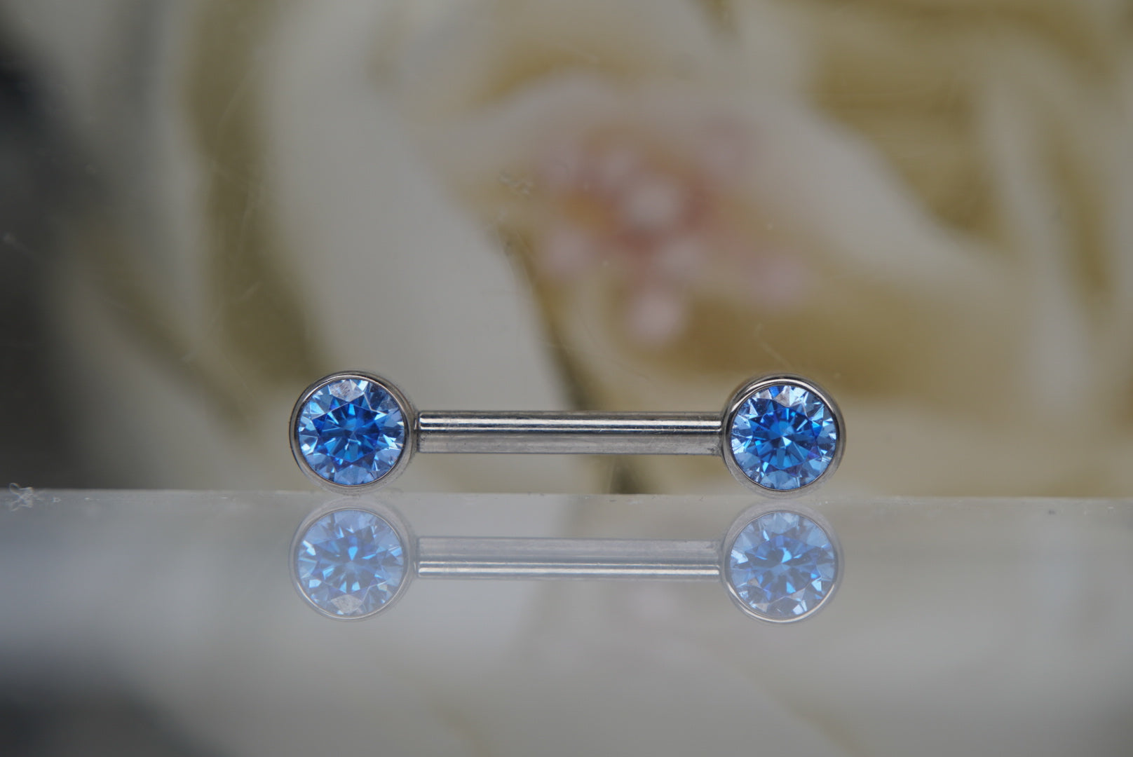 Arctic Blue Crystal Bezel Nipple Barbell in 14g