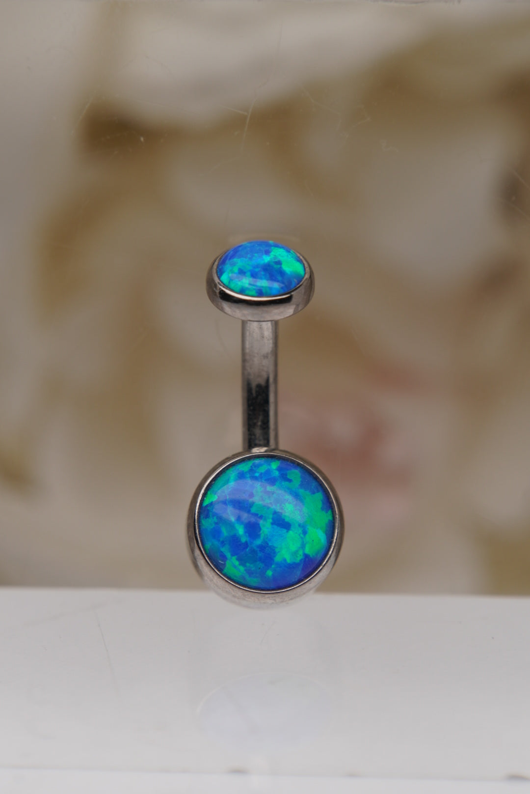 Capri Blue Opal Navel in a Bezel Setting  (4mm/6mm)