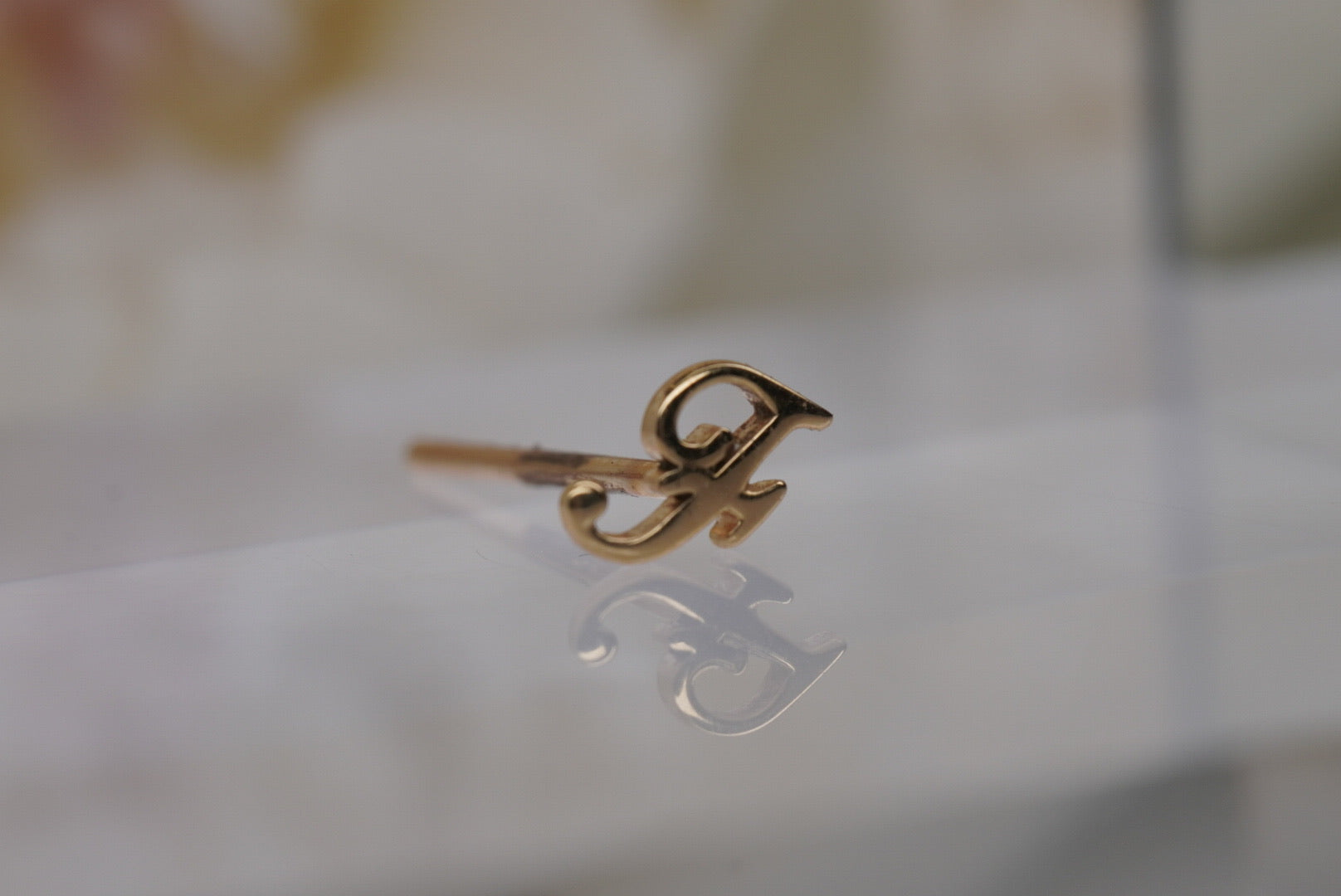Letter "F" Nostril Screw in Yellow Gold