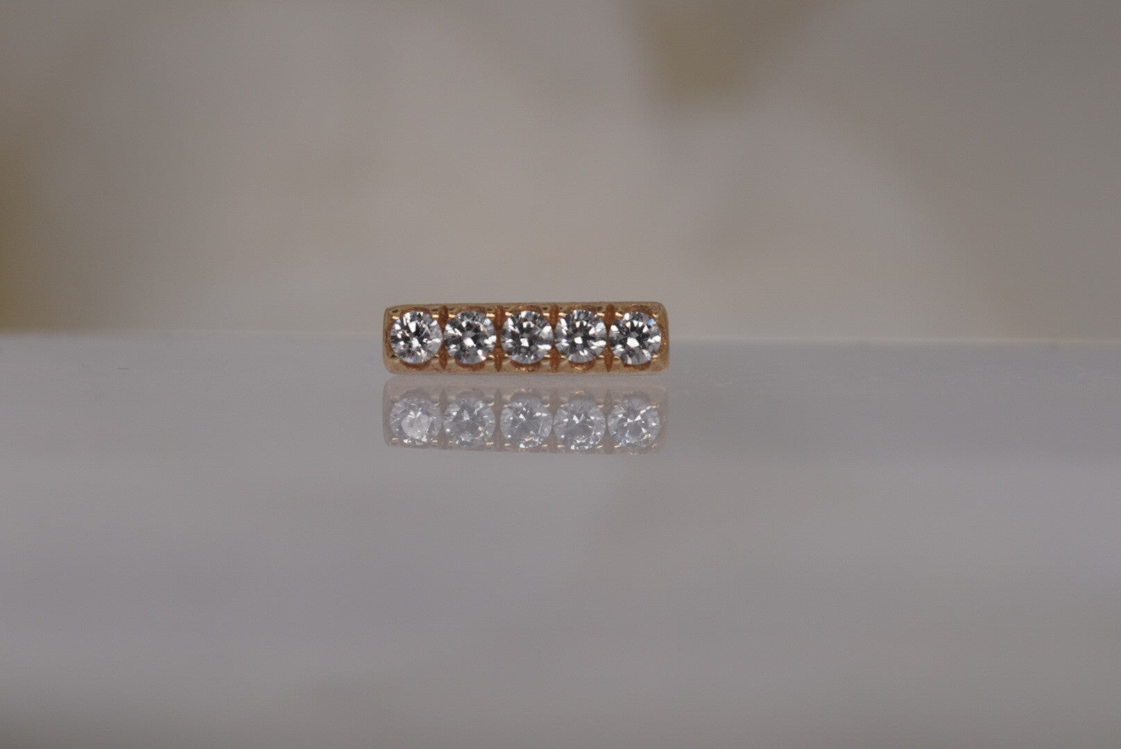 Rowe | Buddha Jewelry | 14k Gold White Sapphire Threadless Piercing Jewelry