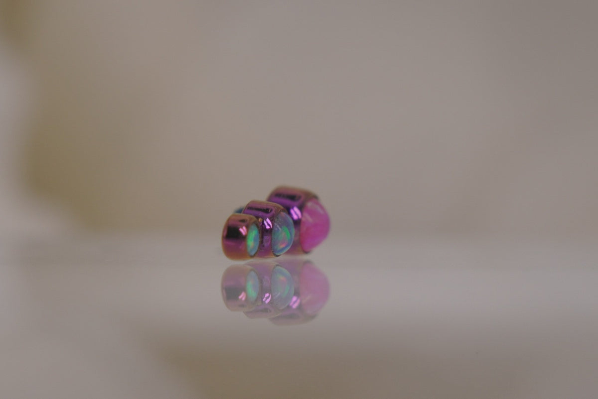 Anatometal 16g  11x5mm "3-Gem Cluster" in Mimosa & Bubble Gum Opals Anodized Pink angled view