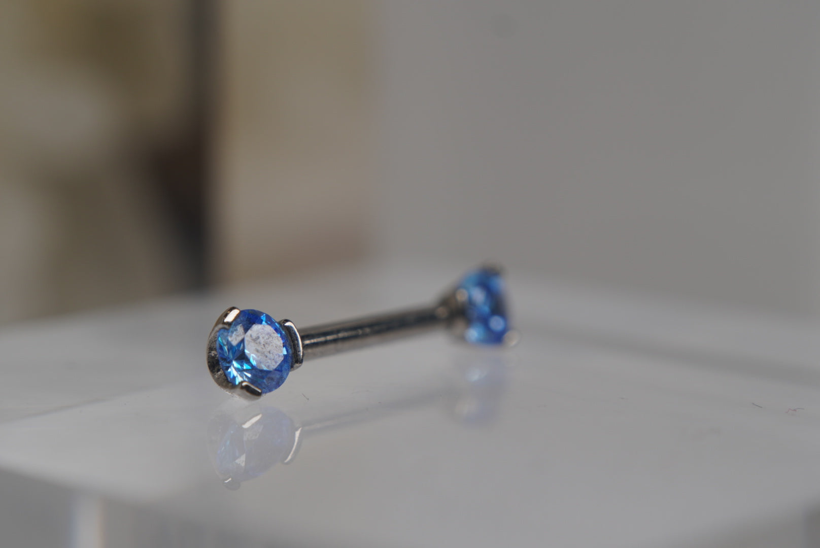 Arctic Blue Crystal Prong Nipple Barbell in 14g