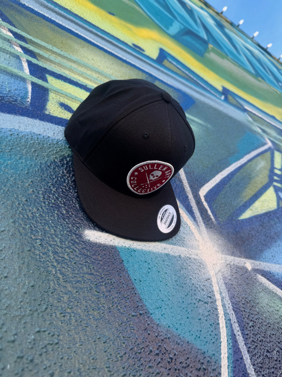 Sullen's "Always Snapback" Hat tattoo apparel Black hat Red Badge side view