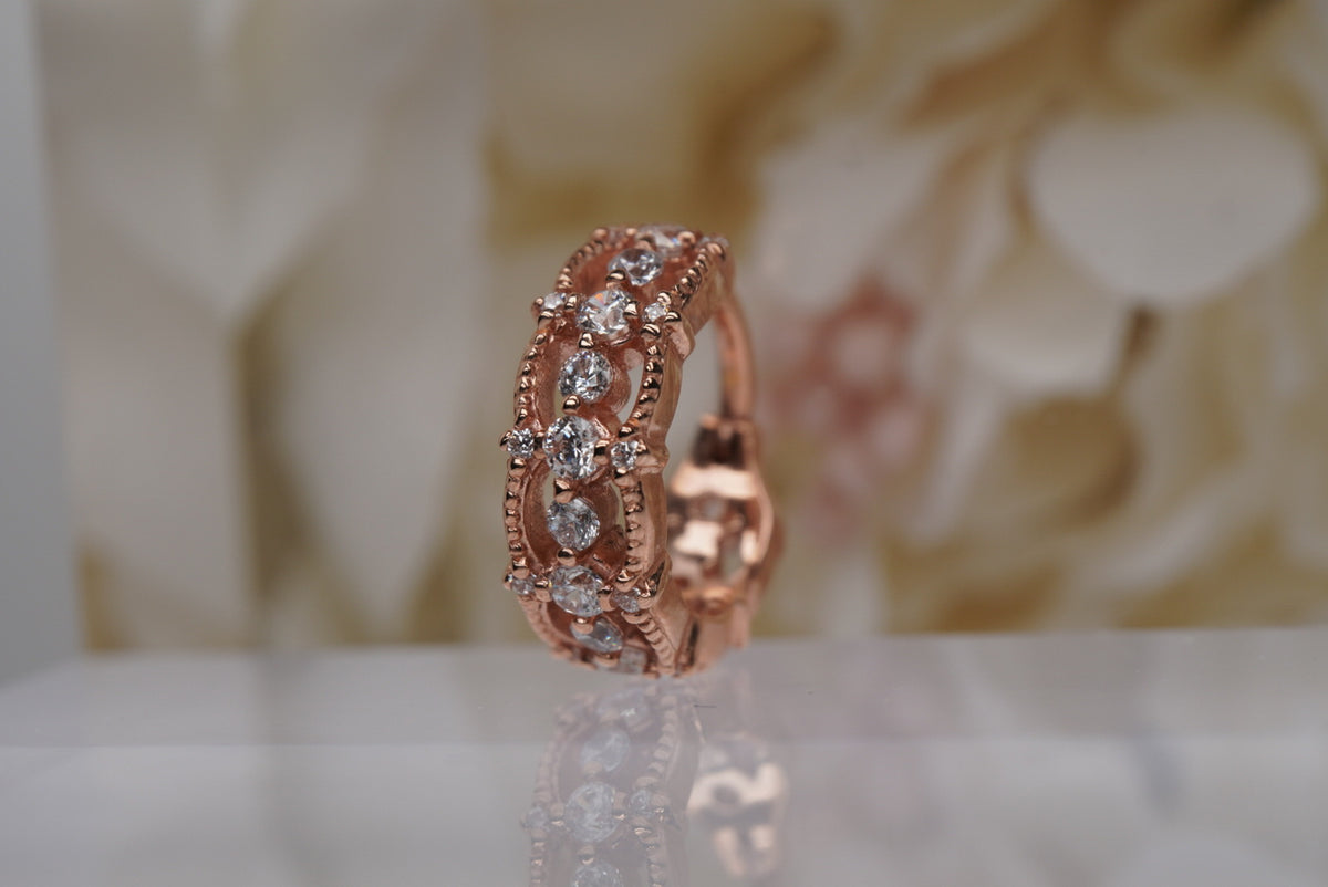 Photo of "Chaaya" Clicker in 16g 3/8" Rose Gold with White Crystals, front view