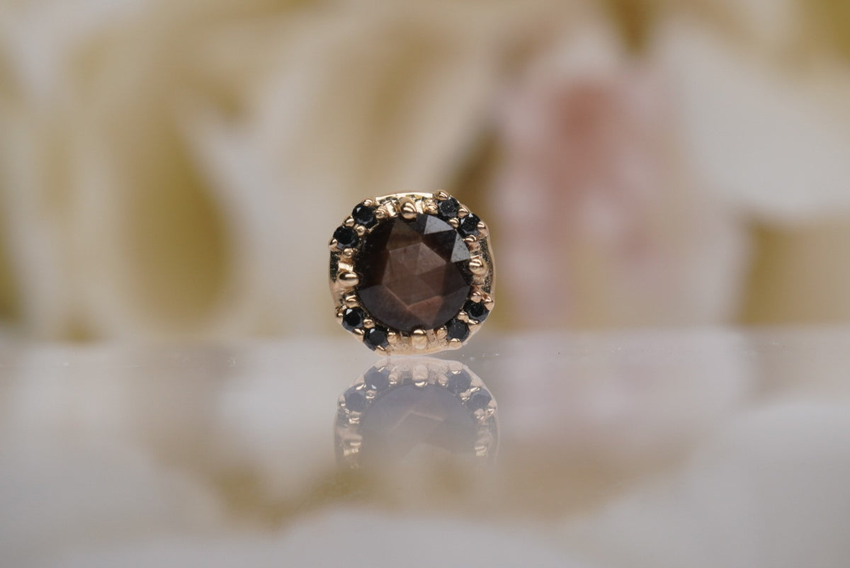 The Galaxia is a stunning prong setting with a custom rose-cut Zawadi Sapphire surrounded by eight 0.8mm genuine black diamonds threadless Yellow gold white gold rose gold