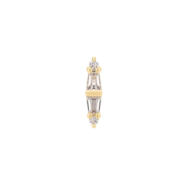 Stock image of Buddha Jewelry’s “Essential” in 14k yellow gold, showing its slender profile and shimmering crystal arrangement.